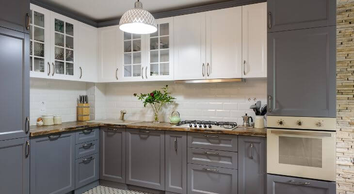 grey kitchen cabinets with gold hardware